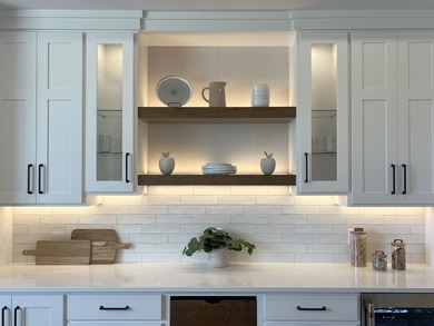 Step into this sunlight-filled home with Amish made built-ins - photo 14