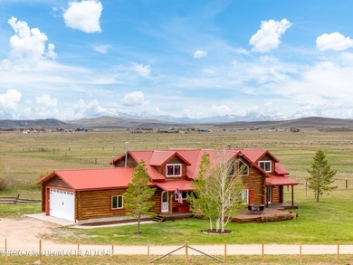 Stunning 2,532 sq ft log home on 90 working acres in the heart - photo 1