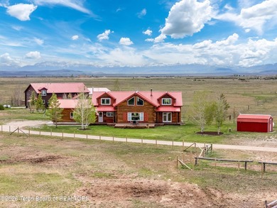Stunning 2,532 sq ft log home on 90 working acres in the heart - photo 3