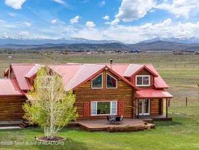 Stunning 2,532 sq ft log home on 90 working acres in the heart - photo 5