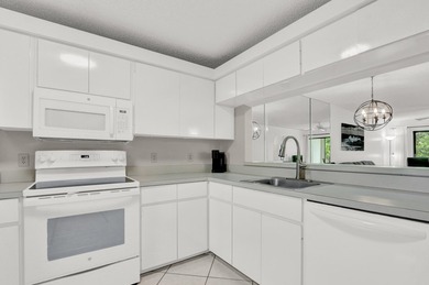 Steps from the beach, this inviting residence at 115 Bamboo Rd - photo 1