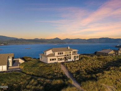 Perched at the edge of the Pacific within the exclusive gated - photo 2