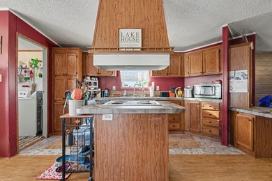 This beautifully maintained 3-bedroom, 2-bath home offers over 2