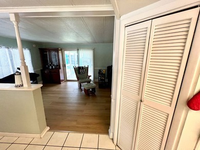 Welcome to this charming two-bedroom mobile home located in the - photo 13
