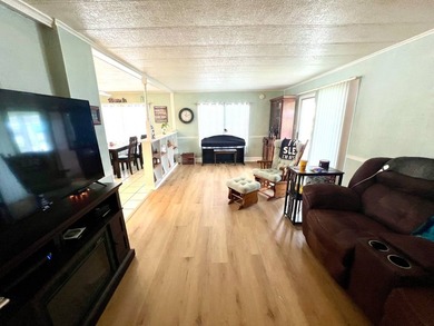 Welcome to this charming two-bedroom mobile home located in the - photo 17