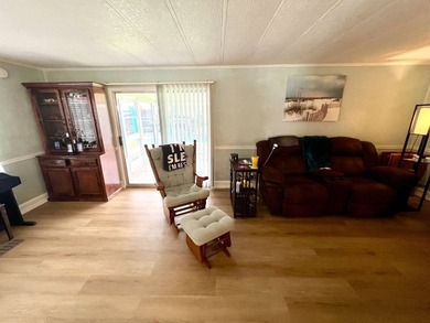 Welcome to this charming two-bedroom mobile home located in the - photo 20