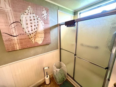 Welcome to this charming two-bedroom mobile home located in the - photo 30