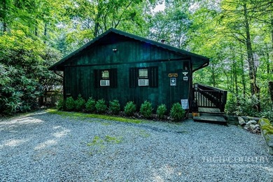 This charming mountain cottage offers comfortable four-season - photo 1