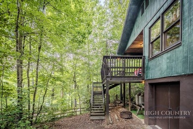 This charming mountain cottage offers comfortable four-season - photo 5