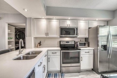 Step into this bright, move-in-ready 2BR/2BA condo in the heart - photo 13