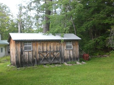 Located on a corner lot, this neat and clean ranch offers easy - photo 19