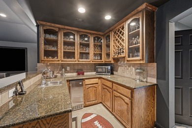 Nestled in the prestigious Enclave at Hidden Lake, this - photo 25