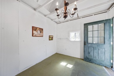 Tucked away in a private, off-the-road setting, this beautifully - photo 34