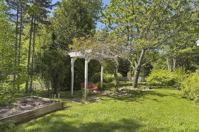 Tucked away in a private, off-the-road setting, this beautifully - photo 36