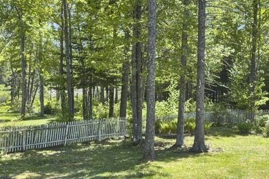 Tucked away in a private, off-the-road setting, this beautifully - photo 42