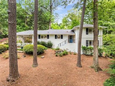 Nestled on a large + acre serene, corner lot in the highly - photo 2