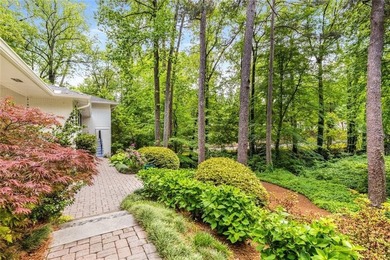 Nestled on a large + acre serene, corner lot in the highly - photo 5