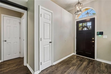 This custom-built home is situated on a private, wooded homesite - photo 6