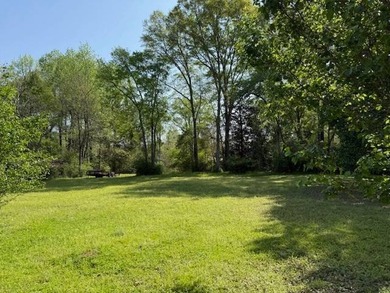 This unique house sits on approximately 3 acres. It has 3