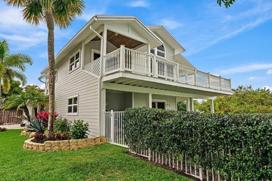 Walk to Beach! Nestled within the exclusive gated Jupiter Beach - photo 5
