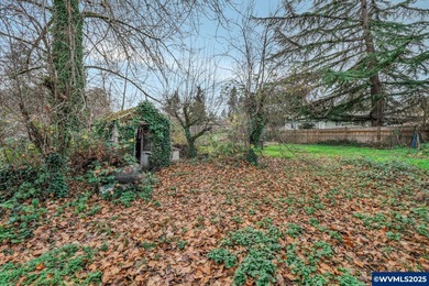 Opportunity knocks in Salem! Situated on a generous .25-acre lot