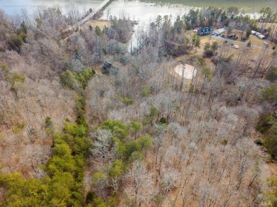 Rare opportunity! 4.90 acres of pristine wooded bliss with lake - photo 2
