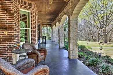 Exceptional custom stone and brick home on nearly one acre in