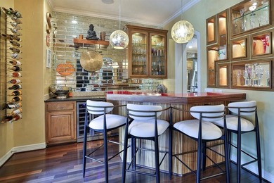 Exceptional custom stone and brick home on nearly one acre in