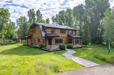 This delightful log home is set on 3.10 acres along Moose-Wilson - photo 1