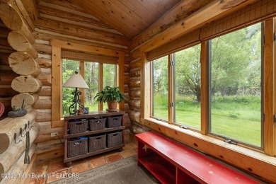 This delightful log home is set on 3.10 acres along Moose-Wilson - photo 4