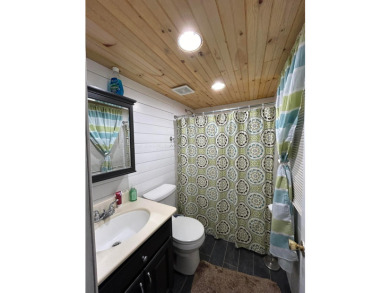 This is a charming cabin on beautiful Smith Lake, built in 1968 - photo 8