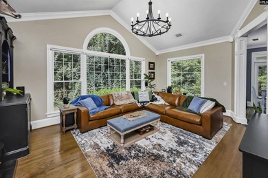 Nestled among nearly two acres of mature old-growth hardwoods in - photo 11