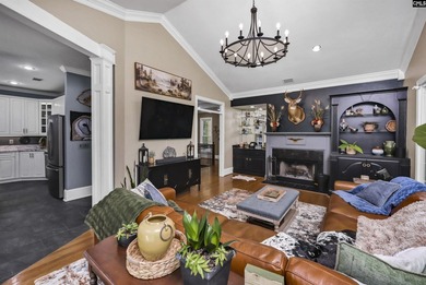 Nestled among nearly two acres of mature old-growth hardwoods in - photo 12