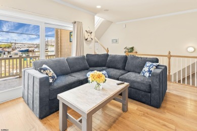 This upscale 3-story townhome has a wonderful water view of