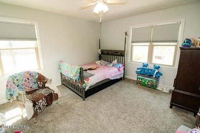Welcome home to this spacious 5BR/3BA split foyer on a level lot - photo 13