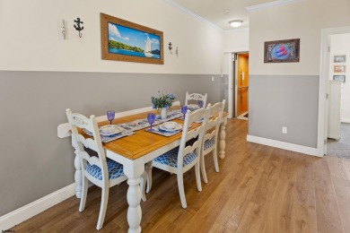 This upscale 3-story townhome has a wonderful water view of