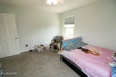 Welcome home to this spacious 5BR/3BA split foyer on a level lot - photo 14