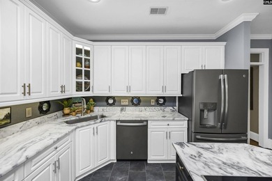 Nestled among nearly two acres of mature old-growth hardwoods in - photo 15