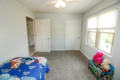 Welcome home to this spacious 5BR/3BA split foyer on a level lot - photo 15