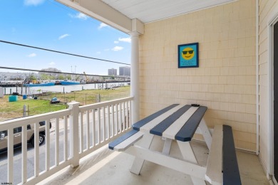 This upscale 3-story townhome has a wonderful water view of