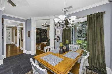 Nestled among nearly two acres of mature old-growth hardwoods in - photo 16