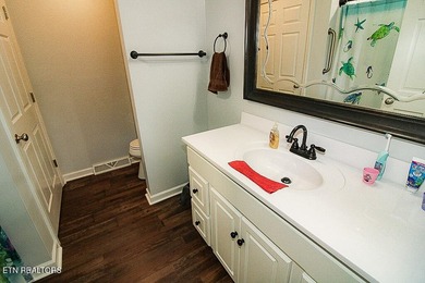 Welcome home to this spacious 5BR/3BA split foyer on a level lot - photo 16