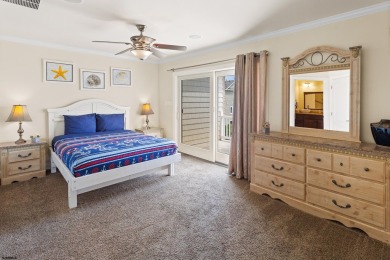 This upscale 3-story townhome has a wonderful water view of