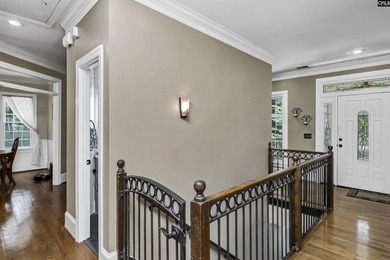 Nestled among nearly two acres of mature old-growth hardwoods in - photo 18