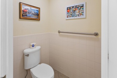 This upscale 3-story townhome has a wonderful water view of