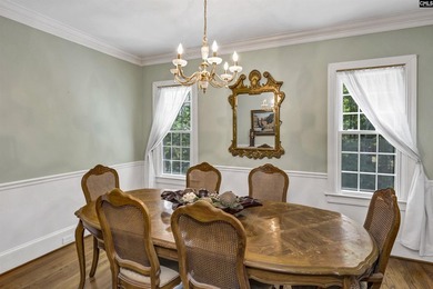 Nestled among nearly two acres of mature old-growth hardwoods in - photo 25