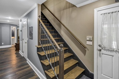 Nestled among nearly two acres of mature old-growth hardwoods in - photo 33