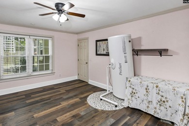 Nestled among nearly two acres of mature old-growth hardwoods in - photo 37