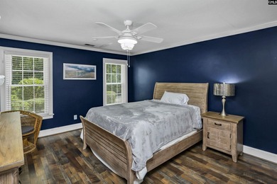 Nestled among nearly two acres of mature old-growth hardwoods in - photo 39