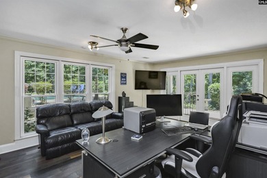 Nestled among nearly two acres of mature old-growth hardwoods in - photo 42